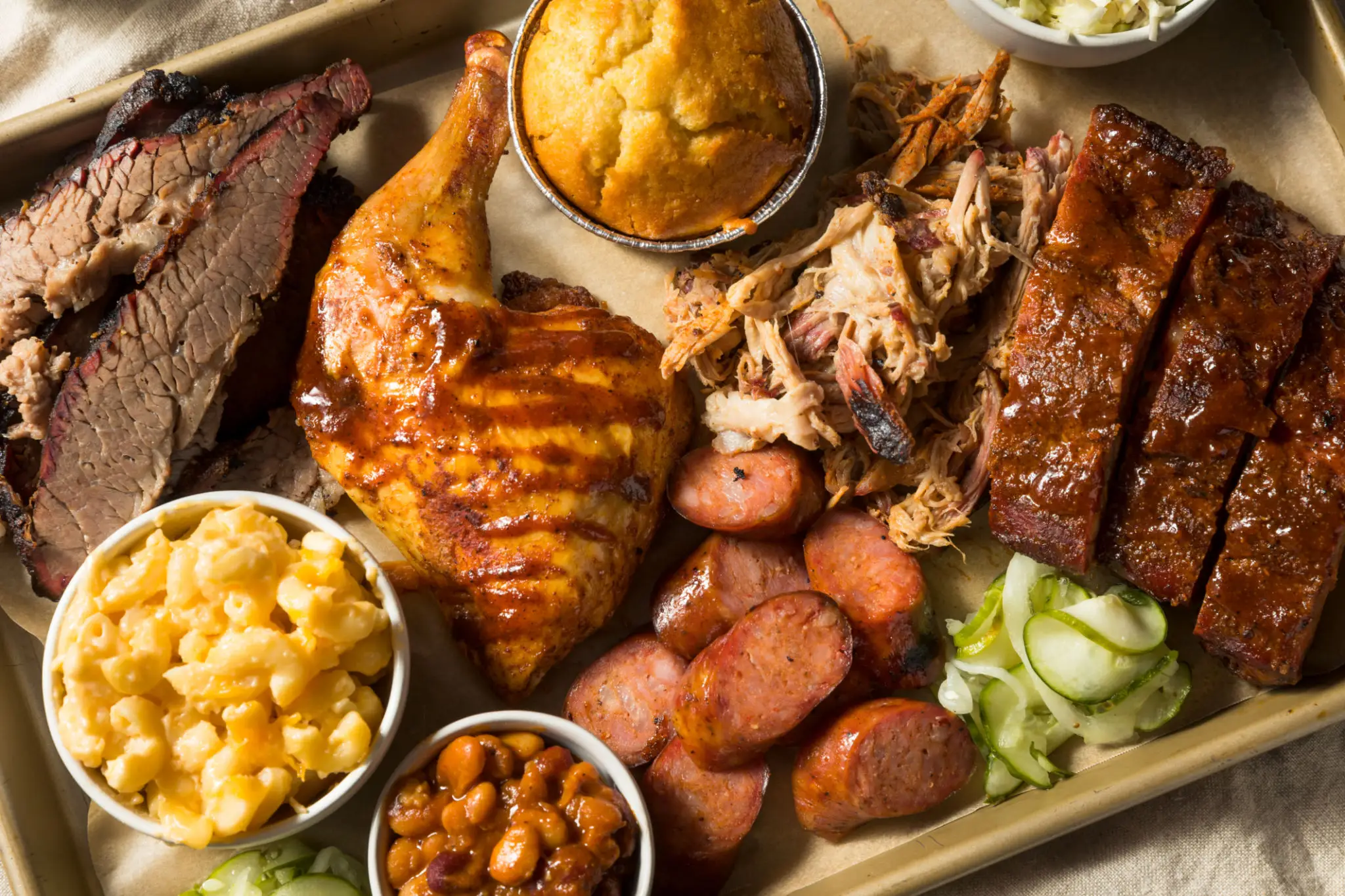 Smoked barbecue platter with ribs, brisket, sides