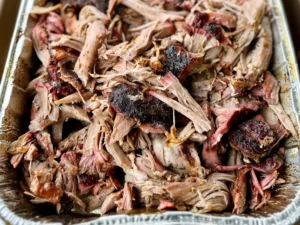 Smoked pulled pork in foil tray